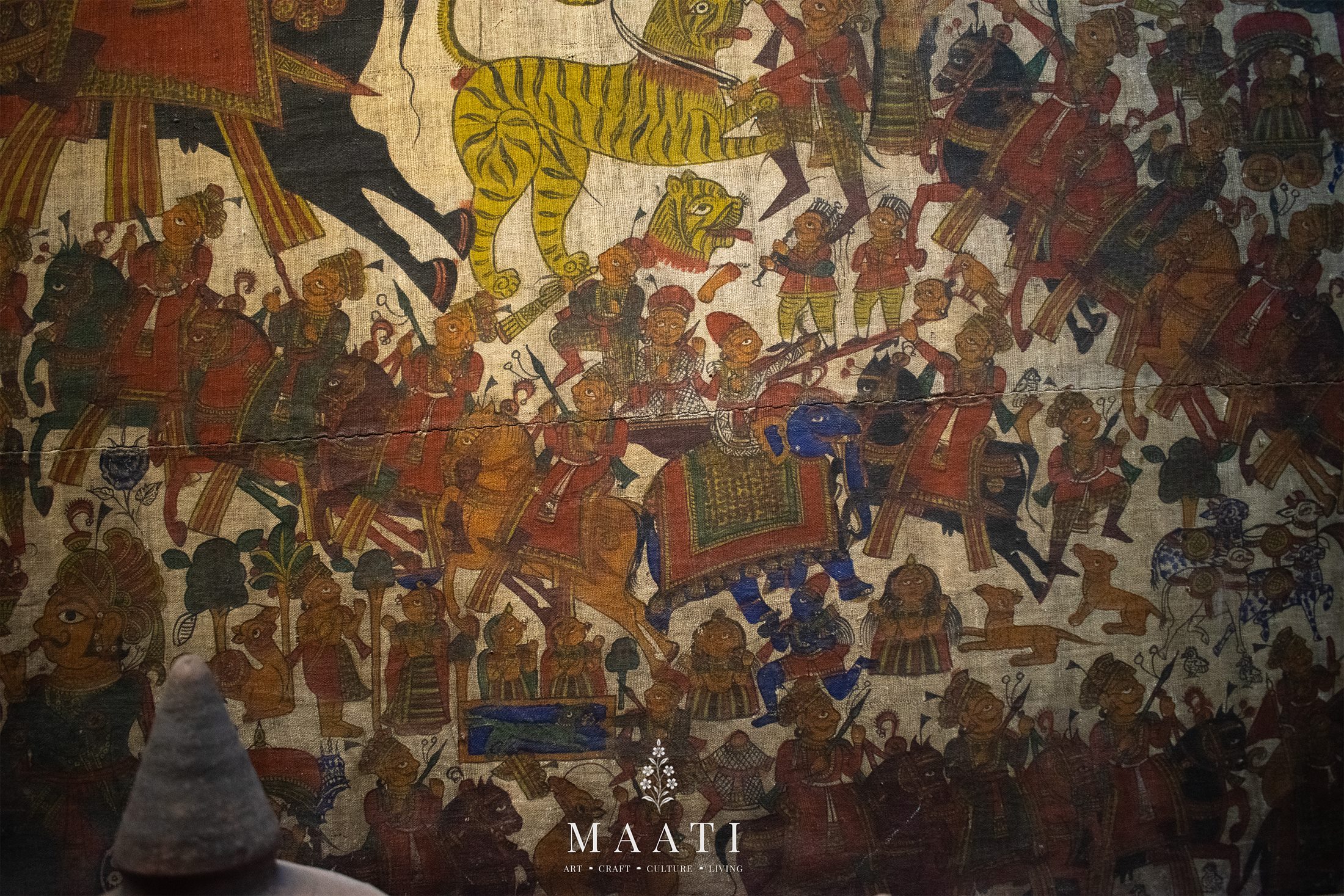 A Chitrakathi painting showing a dense procession scene