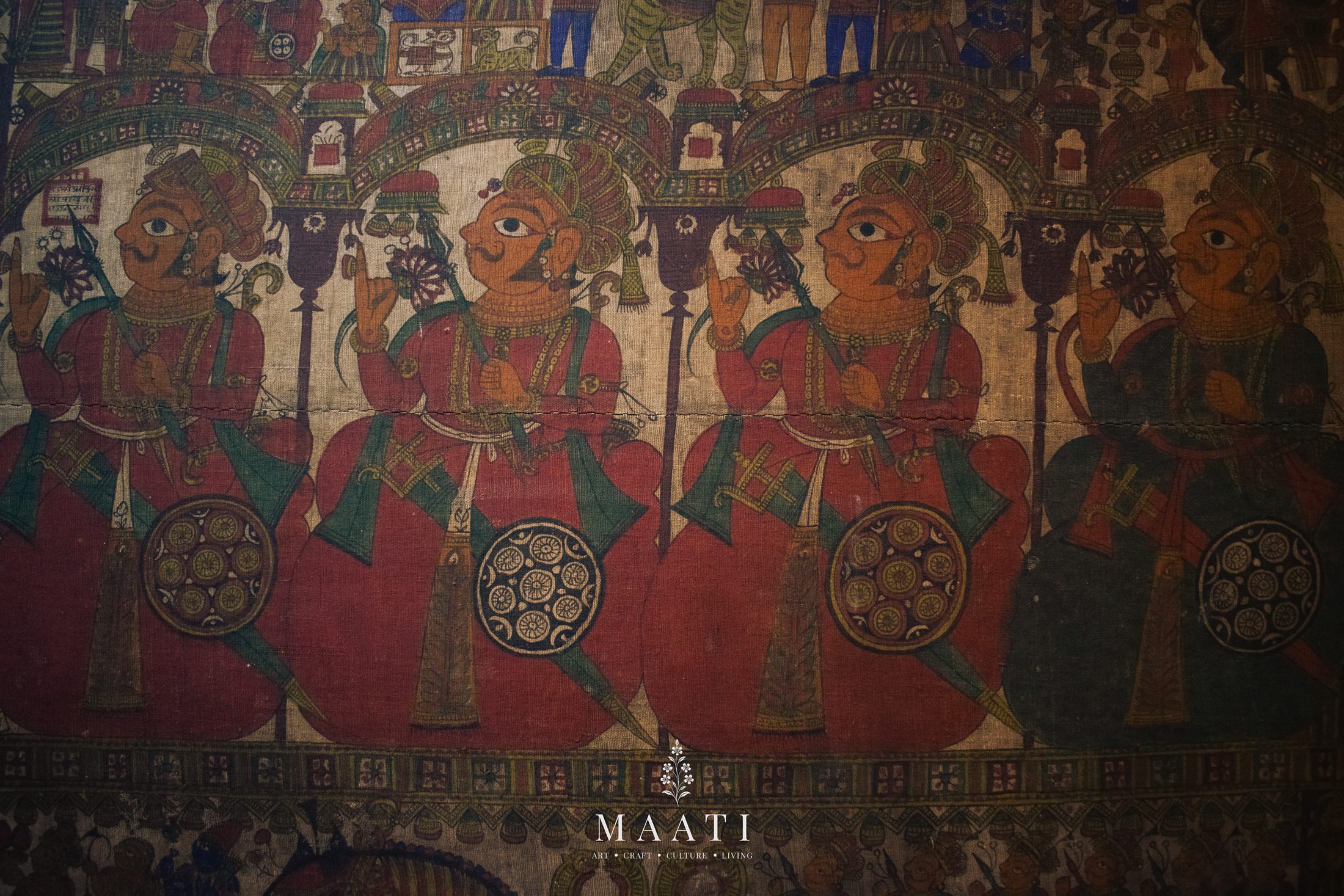 A row of figures from a Chitrakathi painting